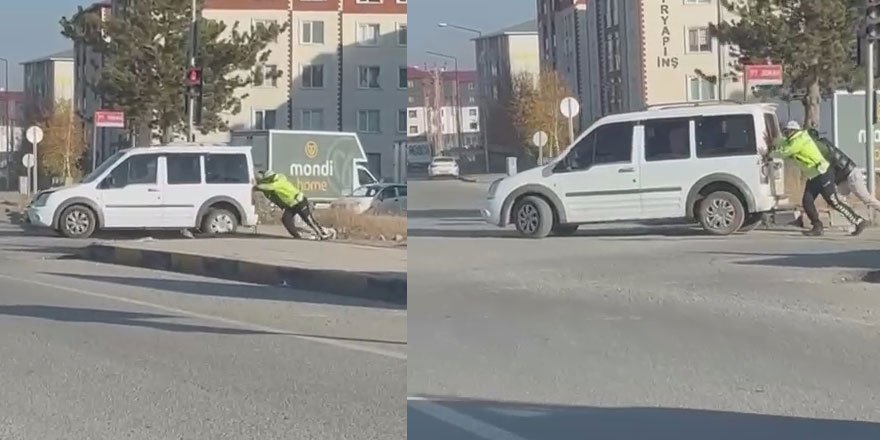 Kars’ta arızalanan aracı polis itekledi