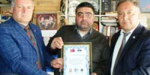 Daşdelen’e plaket