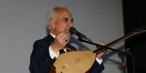 Aşık Enser Şahbazoğlu'ndan Türk Bayrağı'nı yırtan ırkçı Yunan milletvekiline tepki
