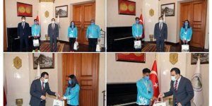 Vali Öksüz şampiyonları makamında ağırladı