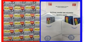 Kars’ta, MHP’den 300 aileye alışveriş kartı